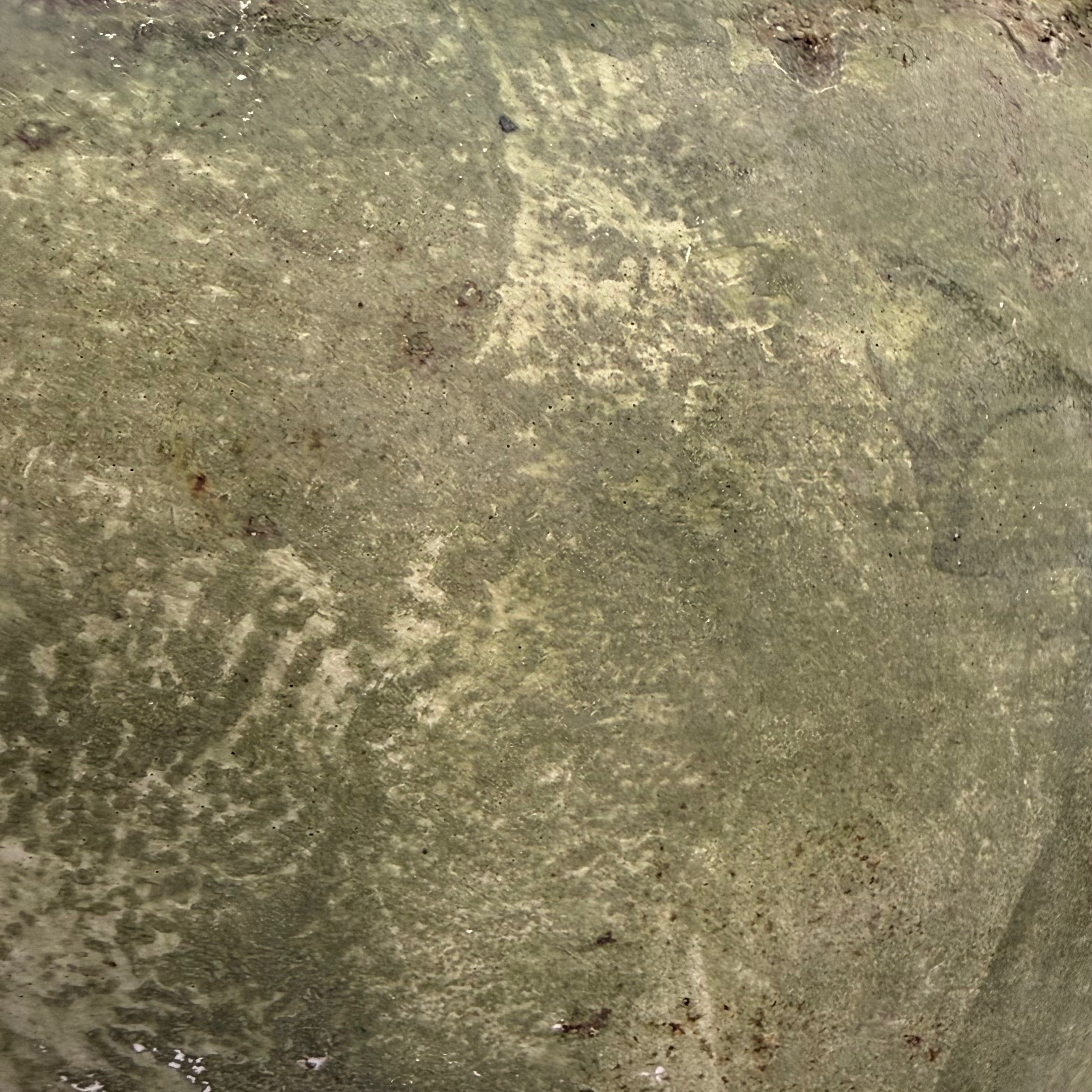 Green whitewashed urn