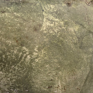 Green whitewashed urn